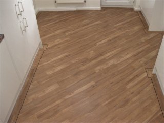 Karndean Knight Tile (colour KP32 Sycamore) with Border. Karndean LVT