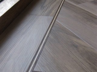 Karndean Opus (REN113 Weathered Elm) fitted with 3 stripe & 1 plank border Karndean Opus LVT