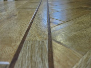 Karndean Art Select (AP01 Blonde Oak) with border. Karndean Art Select Parquet