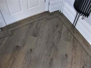 Distinctive Italian Collection LVT (Milano) with black pinstripe and border. Distinctive LVT
