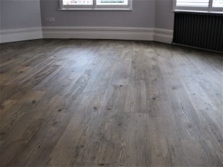 Distinctive Italian Collection LVT (Milano) with black pinstripe and border. Distinctive LVT