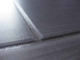 Neobo (colour Cotton Stitch) & Karndean DS15 (Clay) strips (close up) Neobo LVT