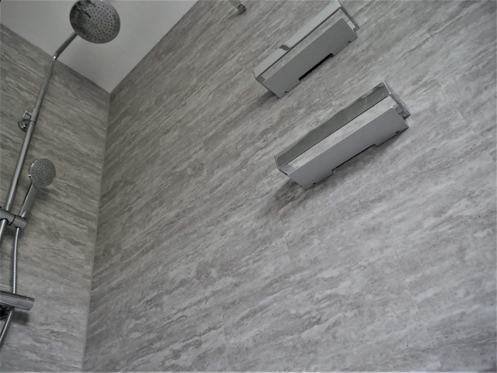 Shower walls tiled with LVT